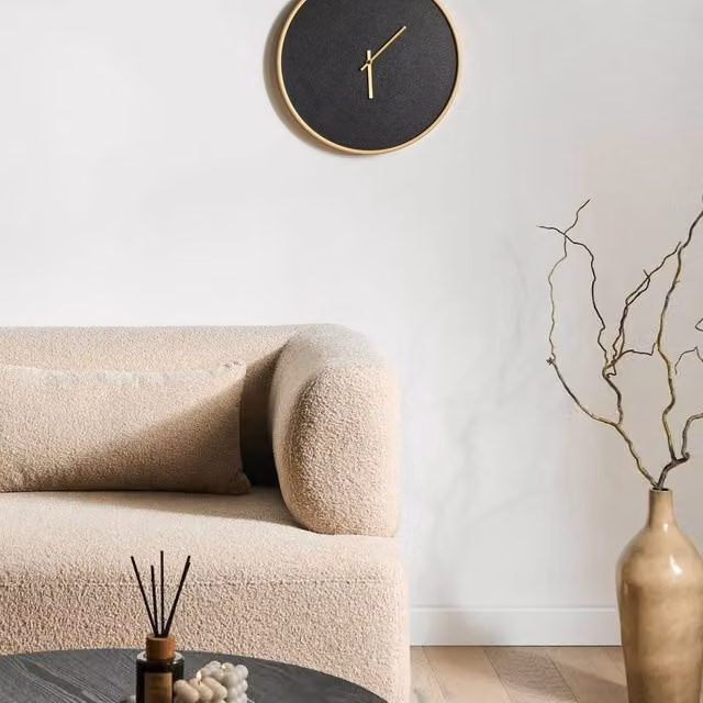 Wyld and Coco Minimalist Round Analog Wall Clock in Black and Gold