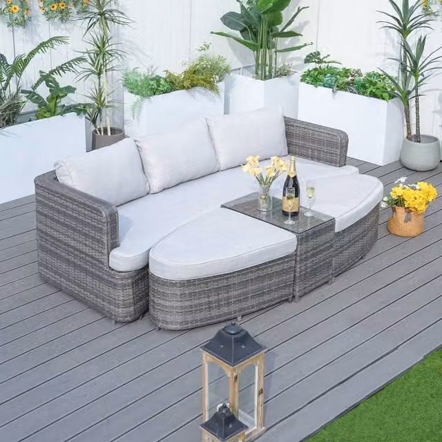 Direct Wicker Grey Rattan Outdoor Garden Furniture Set with 2 Seater Sofa, Ottoman, Coffee Table and Upholstered Cushions