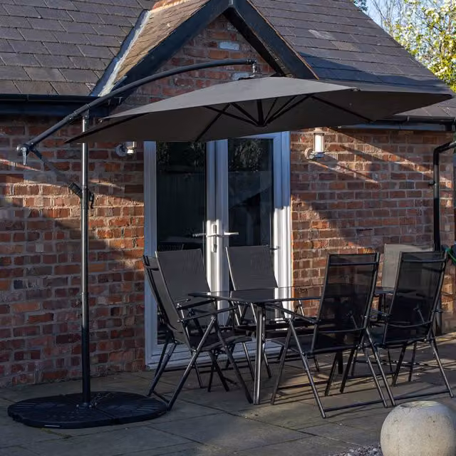 Samuel Alexander 6 Seater Glass Top Dining Set with Grey Banana Parasol and Base in Black