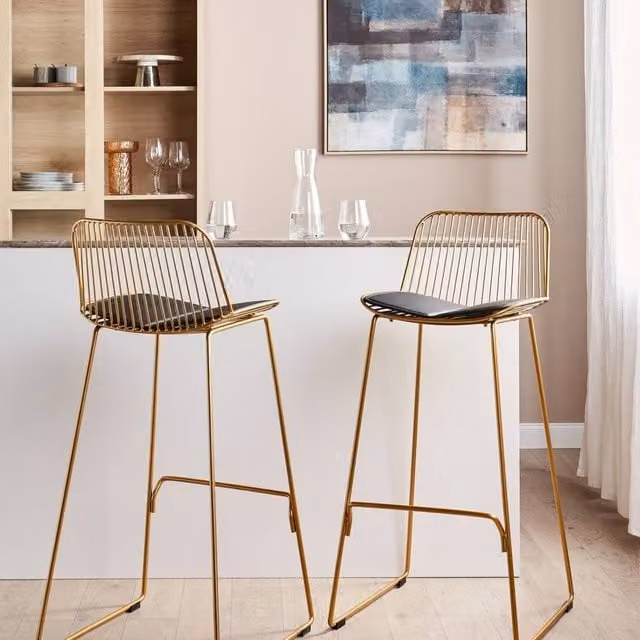 Wyld and Coco Set of 2 Gold Wire Bar Chairs with Black Faux Leather Seats – 1
