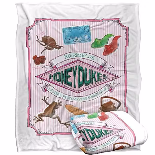 Warner Brothers Harry Potter Honeydukes Hogsmeade Label Fleece Blanket in White and Multicolour, W/D/H: 152 x 127 cm