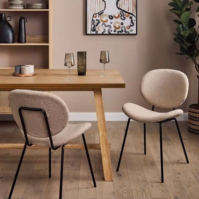 Wyld and Coco Set of 2 Armless Bouclé Dining Chairs in Beige with Black Metal Legs – 1