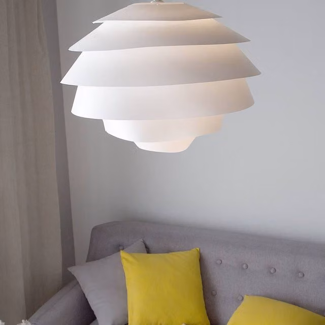 Wyld and Coco Mid-Century White Plastic Globe Pendant Lamp