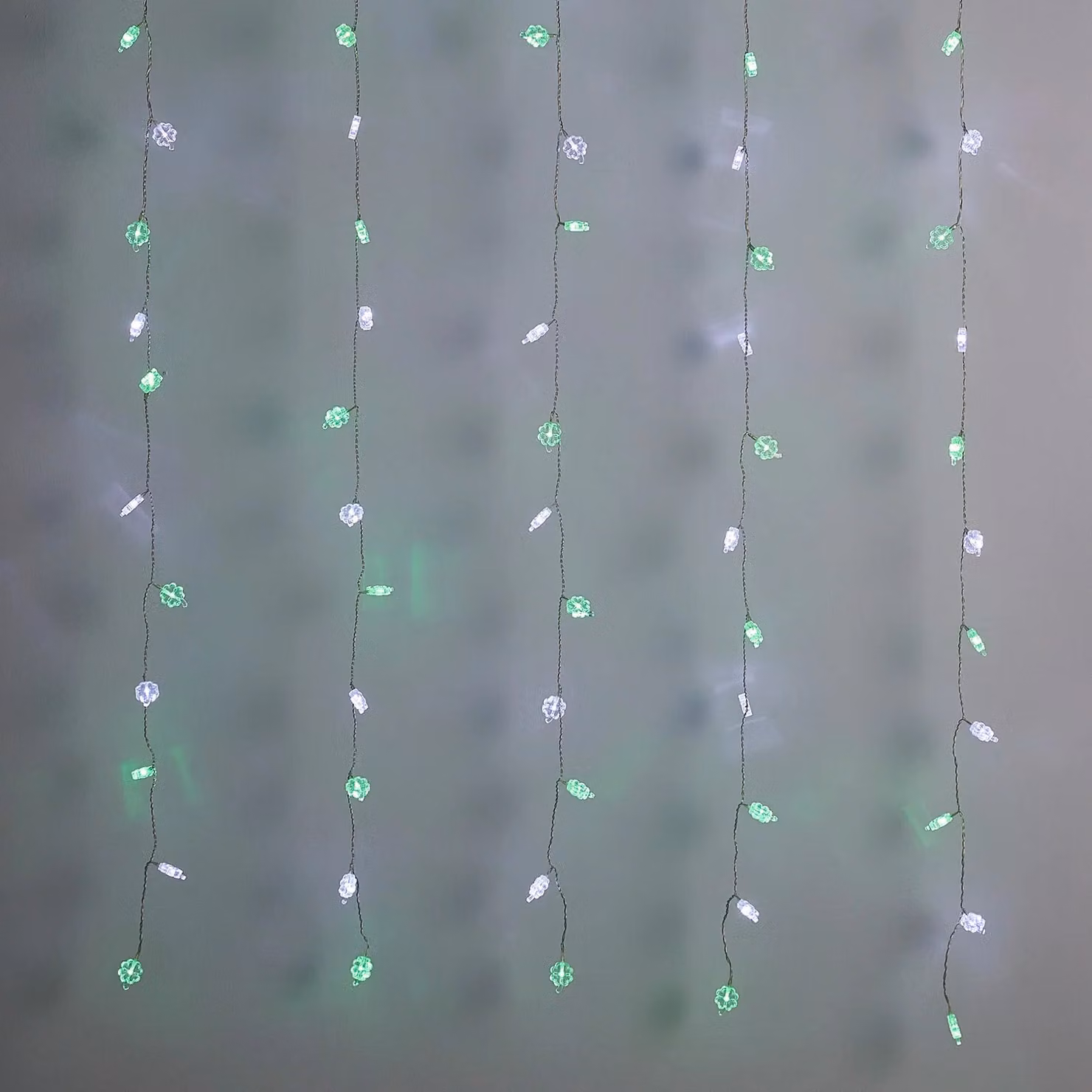 Lights4fun White LED St Patrick’s Day Shamrock Plug In Hanging Curtain Light with Timer, Green and White – 1