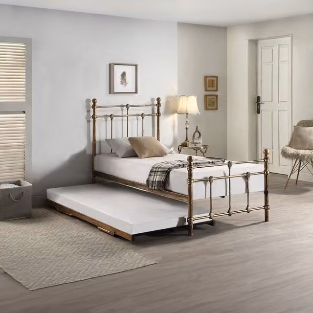 SlumberWorx Classic Metal Single Bed Frame with Guest Trundle in Gold