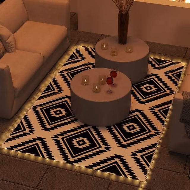Outsunny Reversible Geometric Boho Outdoor RV Rug with LED String Lights in Brown, Black and White