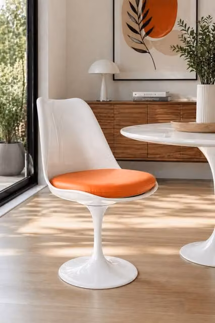 Fusion Living White Tulip Swivel Dining Chair with Orange PU Cushion