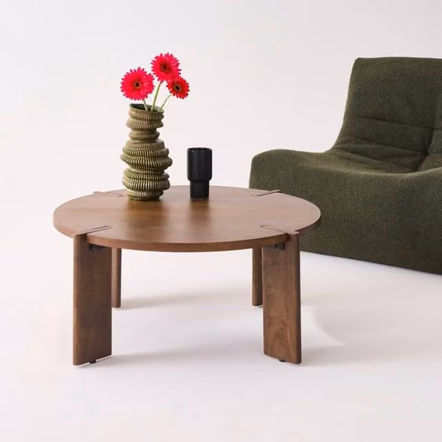 sweeek Exotic Round Solid Wood Coffee Table in Dark Brown