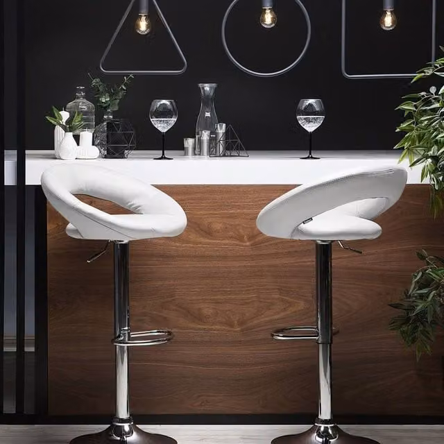 Wyld and Coco Set of 2 White Faux Leather Swivel Bar Stools with Gas Lift and Silver Metal Base – 1