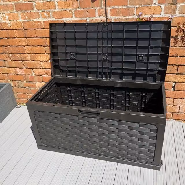 Samuel Alexander 335 Litre Black Rattan Effect Garden Storage Box with Sit on Lid, W: 116.0 cm, D: 56.0 cm, H: 58.0 cm – 1
