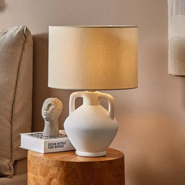 Wyld and Coco White Ceramic Table Lamp with Fabric Cylinder Shade – 1