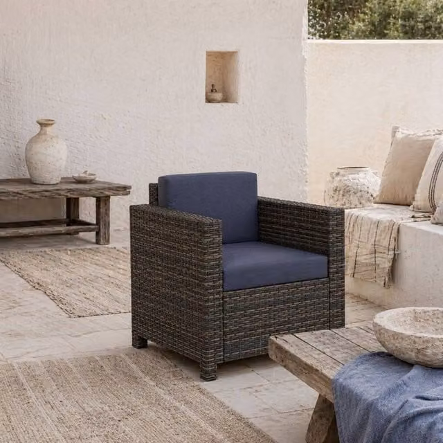 Wyld Haus Zivi Mixed Brown PE Rattan Garden Armchair with Navy Cushions W/D/H: 75 x 70 x 80 cm – 1