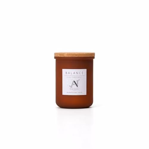 Aroma Naturals Balance Scented Candle in a Brown Glass Jar with Cork Lid