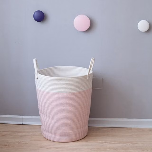 Livingandhome Woven Pink Fabric Laundry Basket with Pom Poms and Wheels, Diameter: 50 cm