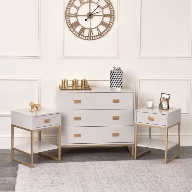 Melody Maison Elle Stone Range Large 3 Drawer Chest of Drawers and Pair of Bedside Tables in Light Grey and Gold