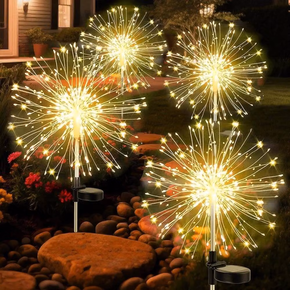 FLAVORA 6 Pack Solar Powered LED Firework Starburst Stake Lights in Black with Warm White Effect – 2