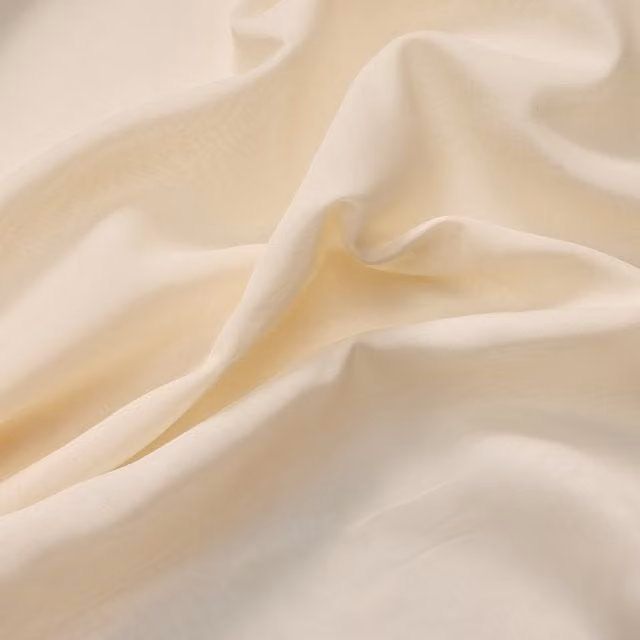 Prestigious Textiles Spotlight Plain Fabric in Vanilla White and Beige