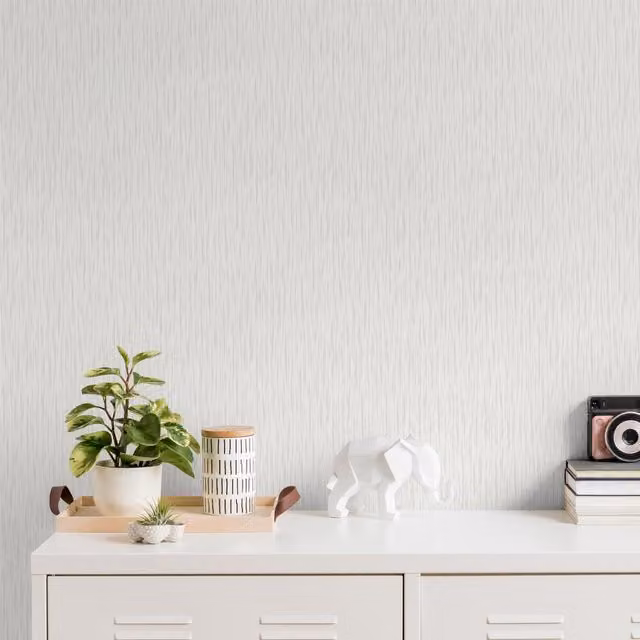 Muriva Abstract Plain Industrial Wallpaper in White and Silver