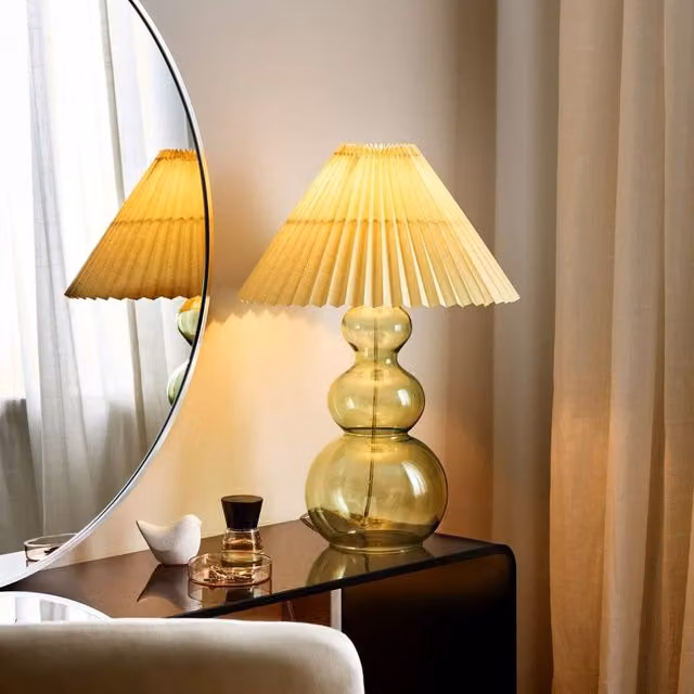 Wyld and Coco Green Glass Table Lamp with Pleated Bell Shade