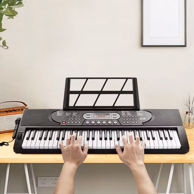 Komore 61-Key Portable Electronic Piano with Light-Up Keys, Black