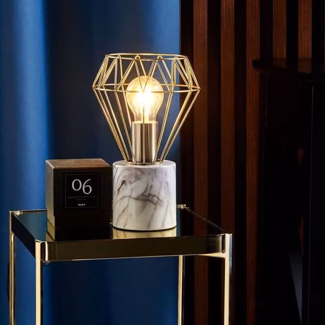 Wyld and Coco Table Lamp with Diamond Cage Shade and Marble-Look Round Base in Bronze – 1