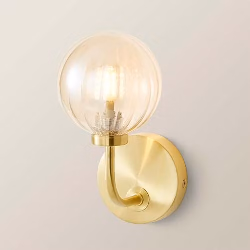 ValueLights Gold Metal Curved Stem Wall Light with Amber Ribbed Glass Globe Shade