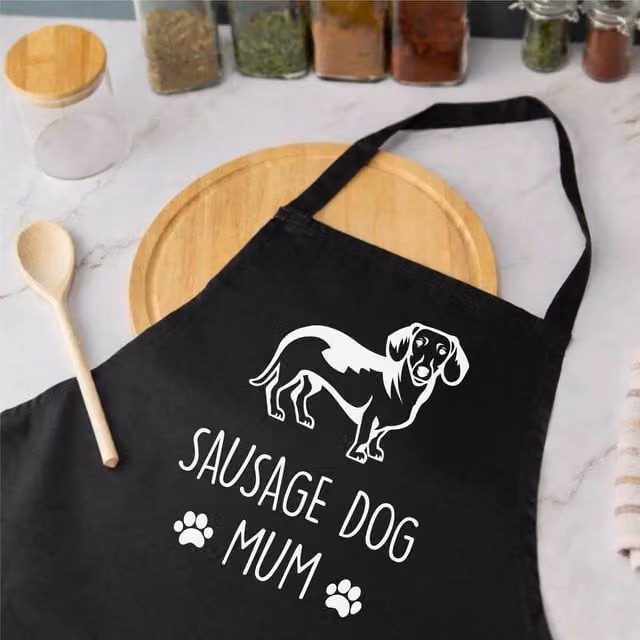 60 SECOND MAKEOVER Women's Sausage Dog Mum Apron in Black