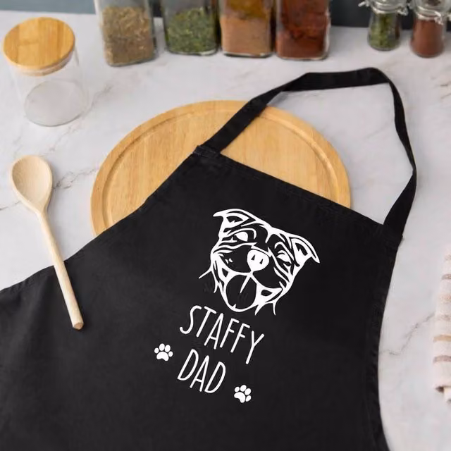 60 SECOND MAKEOVER Men's Staffy Dad Apron in Black