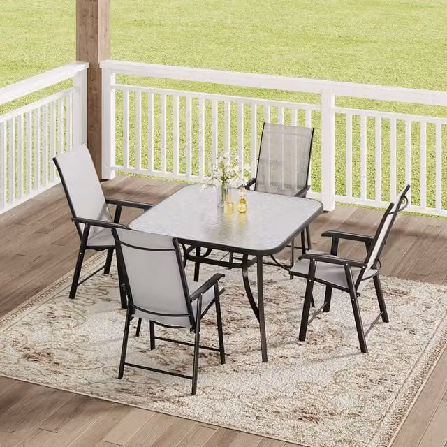 Komore Modern Outdoor Glass Dining Table and 4 Folding Chairs Set in Black