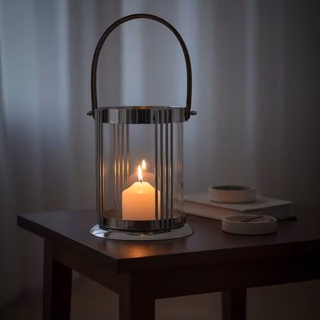 Orsina Modern Round Metal and Glass Tabletop Pillar Lantern in Silver and Black