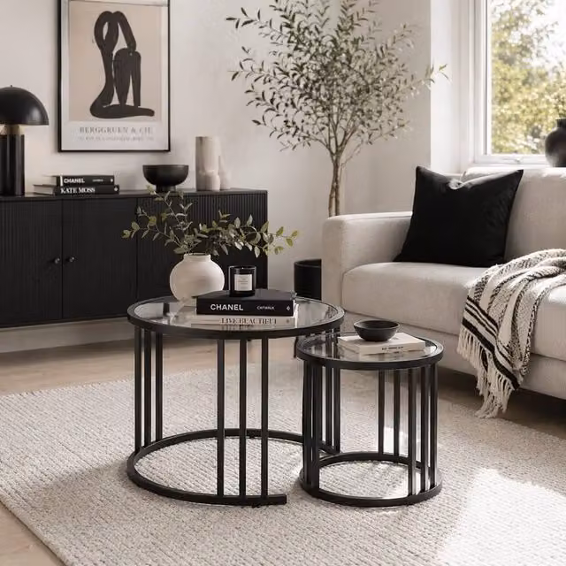 Wyld Haus Kane Set of 2 Round Nesting Tables with Black Metal Steel Frame and Glass Tops – 1