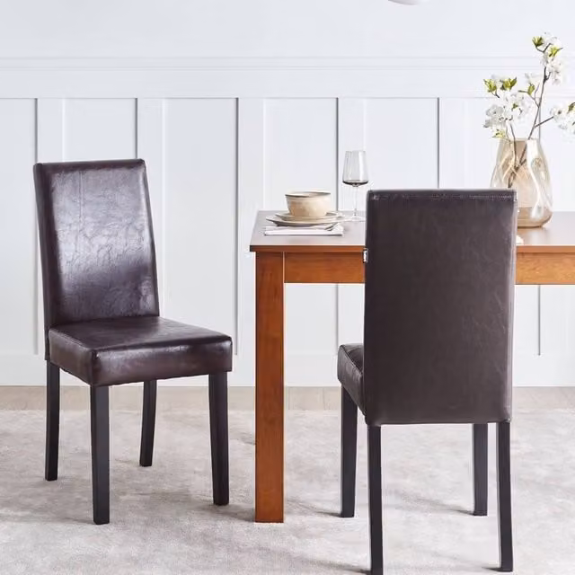 Wyld and Coco Luxe Living Set of 2 Brown Faux Leather Dining Chairs with Rubberwood Legs
