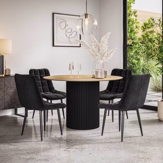 More4Homes Arlo Oak Round Dining Table with Black Legs and 4 Nova Velvet Dining Chairs Set