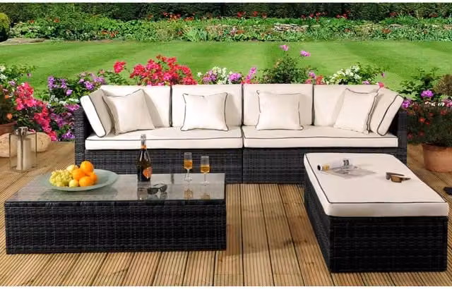 Comfy Living 4 Piece Black Polyrattan L-Shape Garden Patio Furniture Set with Upholstered Cushions and Coffee Table