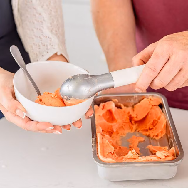 KitchenAid Ice Cream Scoop in White with Ergonomic Handle and Stainless Steel Construction