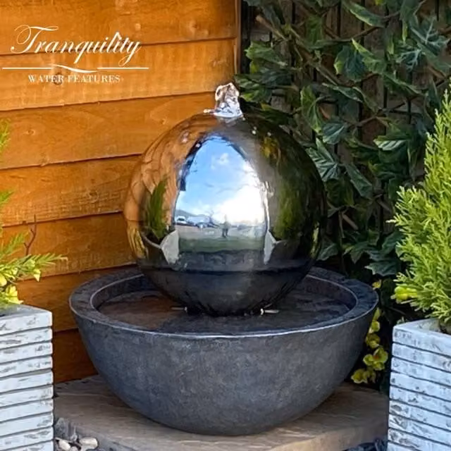 Tranquility Water Features Sphere Solar Metal Water Fountain with Grey Resin Base and Silver Stainless Steel Details