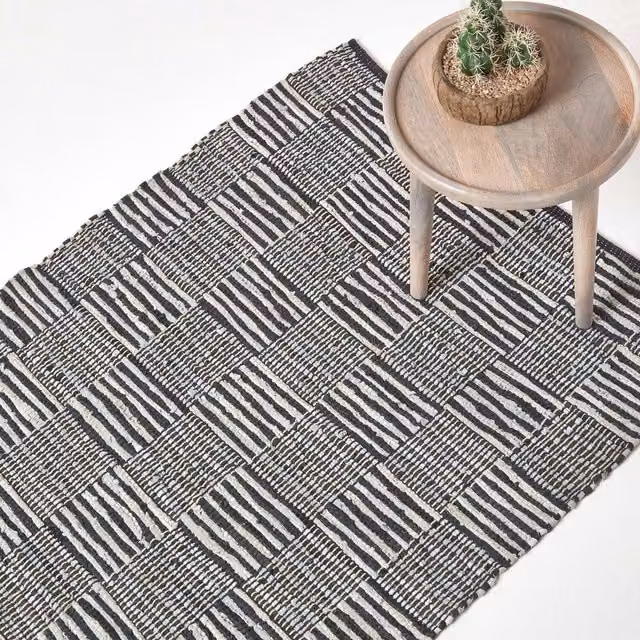 Homescapes Black and White Real Leather Handwoven Striped Block Check Rug, Width: 150 cm