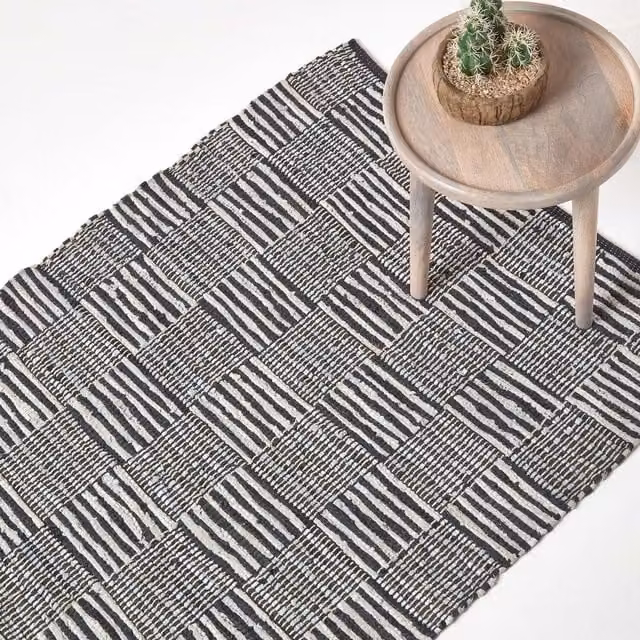 Homescapes Black and White Real Leather Handwoven Striped Block Check Rug, Width: 150 cm