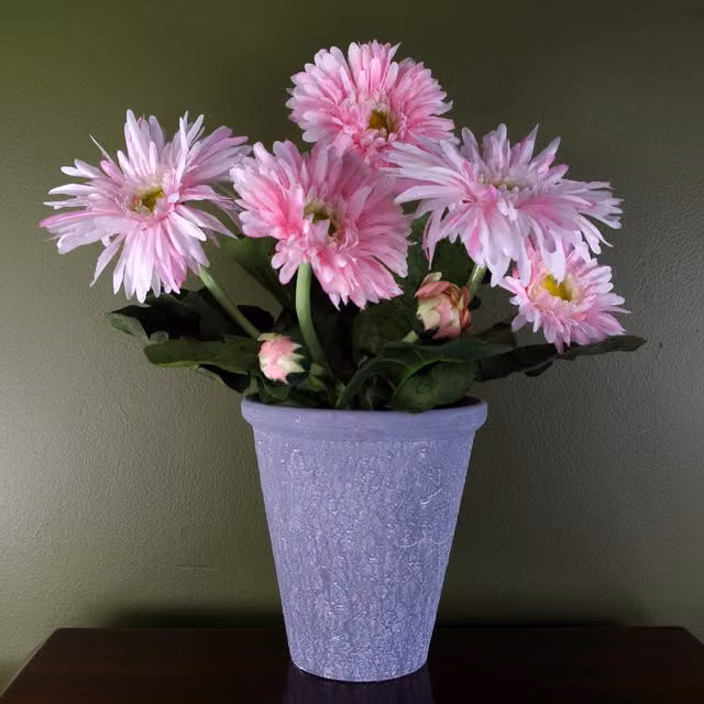 Artificial Pink Daisy Flowering Plant in a Grey Tabletop Pot