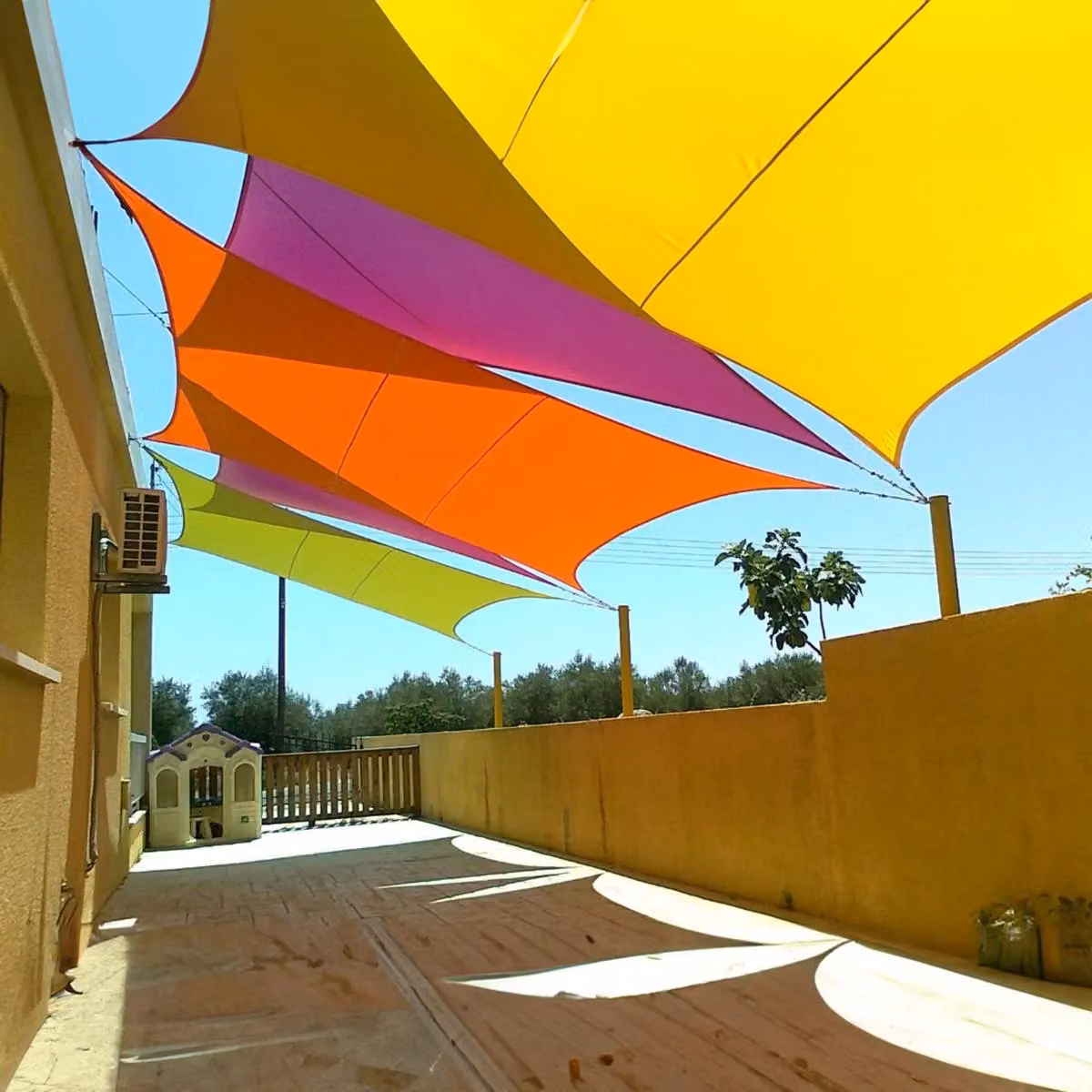 Primrose White Polyester Triangle Water Resistant Patio Sun Shade with UPF 34+ Protection – 5