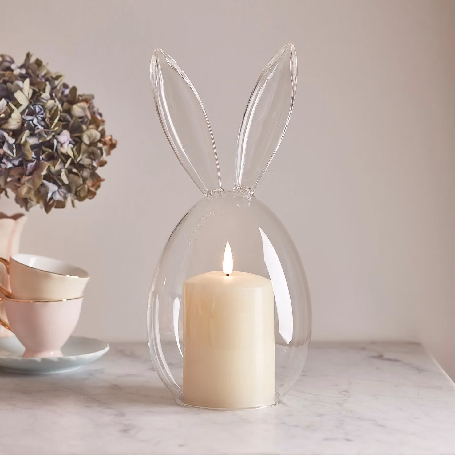 Lights4fun Clear Glass Easter Bunny Display Bell Jar Dome with TruGlow LED Flameless Pillar Candle, H 29.0 cm x W 13.8 cm x D 13.8 cm