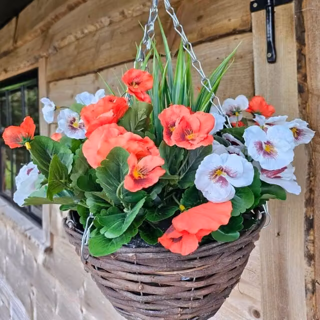 Best Artificial Ltd Red and Multicolour Artificial Pansy Hanging Basket with Green Leaves in a Round Rattan and Galvanised Steel Container