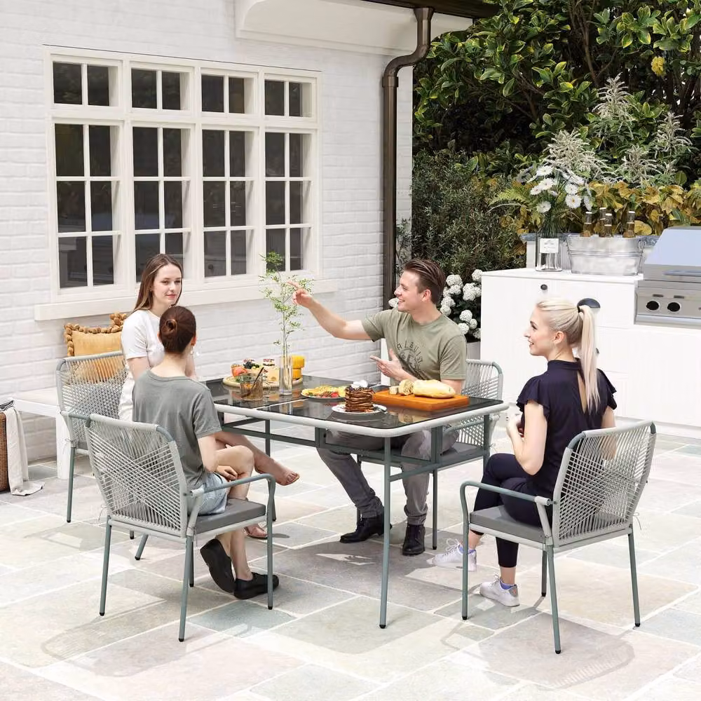 Wyld Haus Rolapa 4 Seater Outdoor Rattan Dining Set with Glass Table and Stackable Chairs in Light Grey – 3