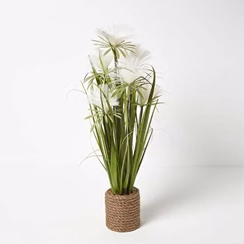 HOMESCAPES Artificial Grass Plant in a Jute Planter with Cream Flowers, Green, Height: 74 cm