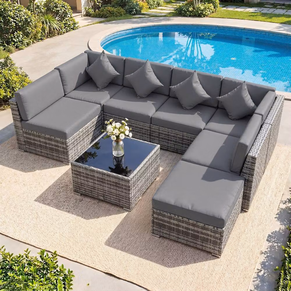 Outsunny 8 Piece Grey Rattan L-Shape Garden Furniture Set with Upholstered Cushions, Ottoman and Coffee Table – 8