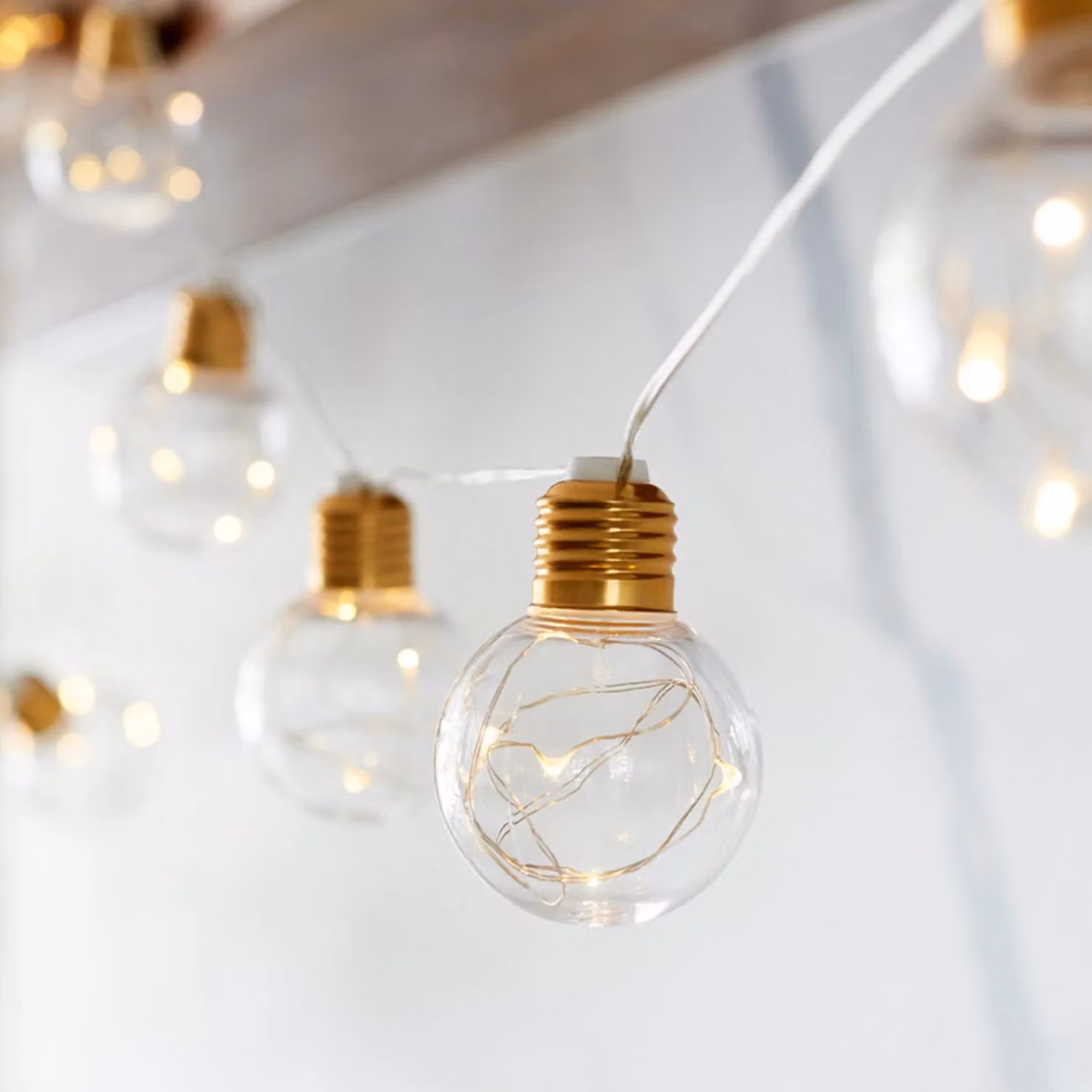 Lights4fun Brass Micro Battery Festoon Lights in Gold with Warm White Transparent Sphere Bulbs