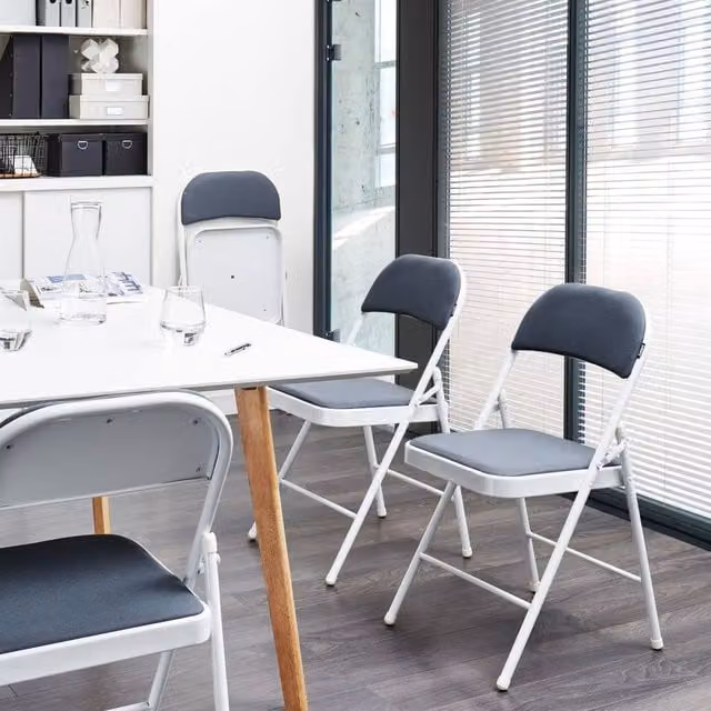 Wyld and Coco Set of 4 Modern Folding Chairs with White Metal Frames and Grey Fabric Cushions – 1