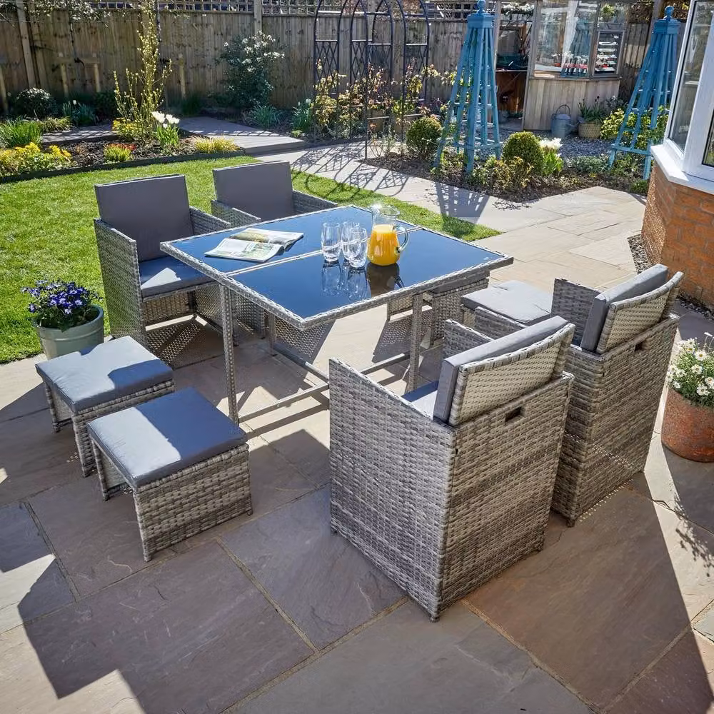 Home Source 9 Piece Grey Rattan Garden Furniture Set with 4 Chairs, 4 Footstools and Square Glass Top Table – 1