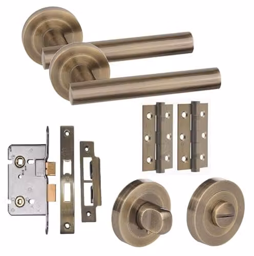 Golden Grace T-Bar Bathroom Door Handle Set with Lock and Rosette in Antique Brass