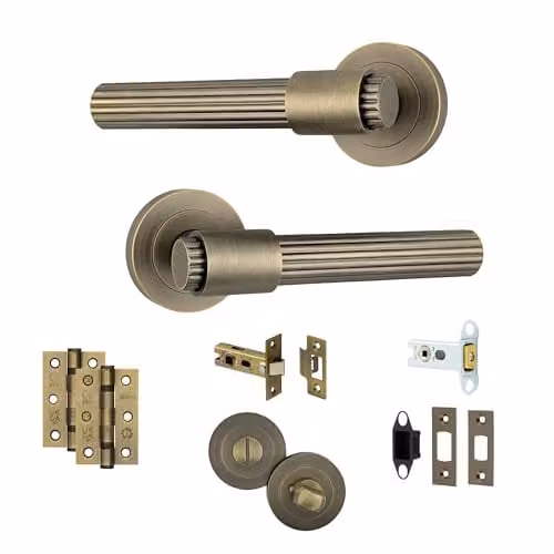AXS Nevada Internal Lever Door Handle Pair with Rose and Bathroom Lock in Antique Brass